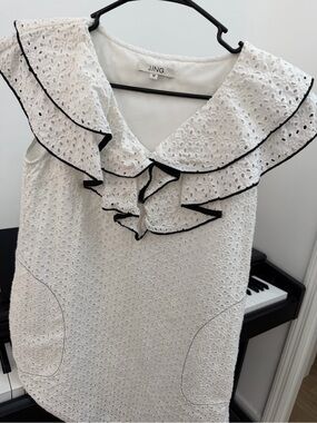 Jing White Eyelet Ruffle Sleeveless mini dress with Black Trim